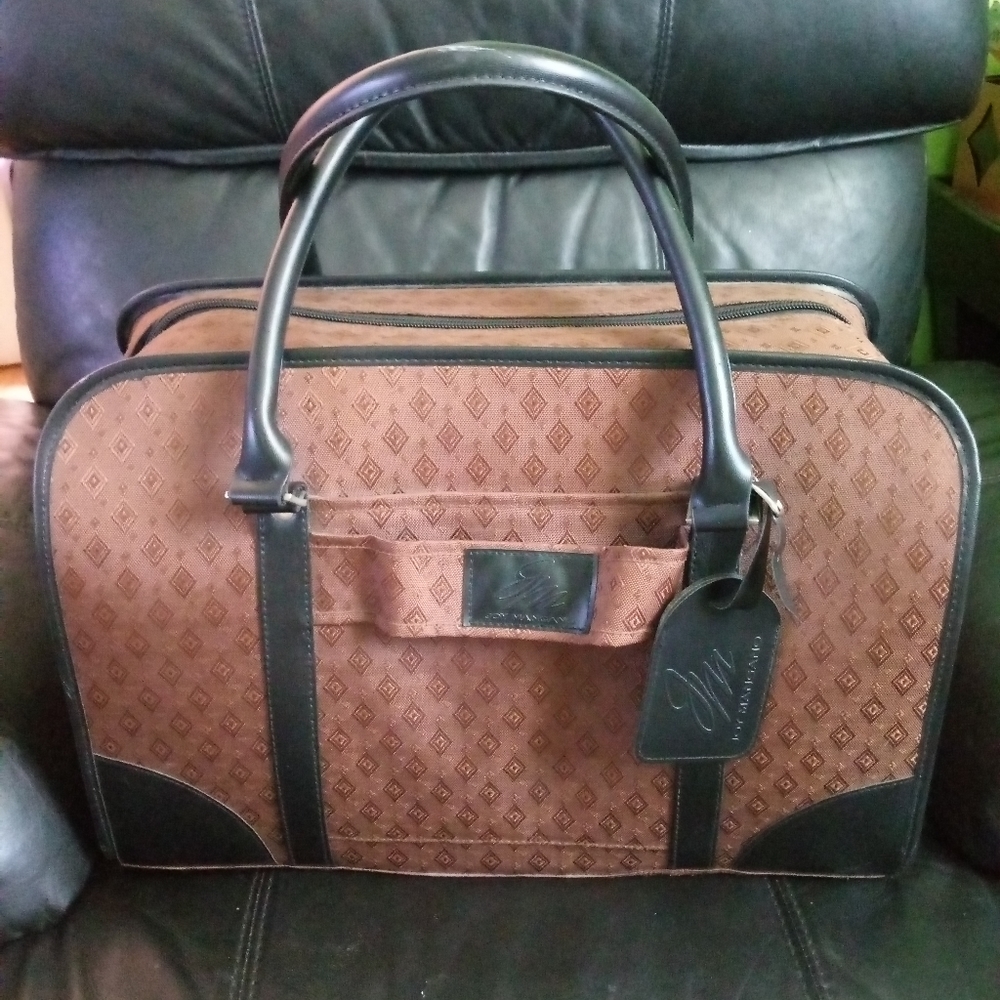 Joy Mangano weekender travel tote. Very classy.
